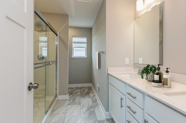 1549 143rd St E, Rosemount, MN 55068 - full bath with double vanity, a shower stall, baseboards, and marble finish floors