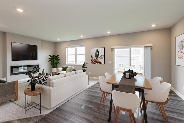 1549 143rd St E, Rosemount, MN 55068 - living area featuring dark wood-style floors, recessed lighting, baseboards, and a glass covered fireplace