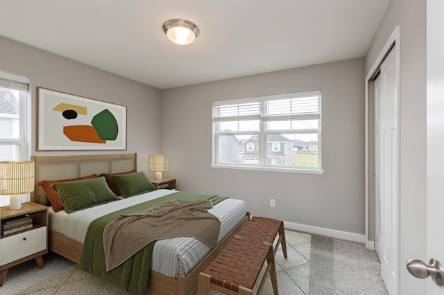 1549 143rd St E, Rosemount, MN 55068 - carpeted bedroom featuring baseboards and a closet