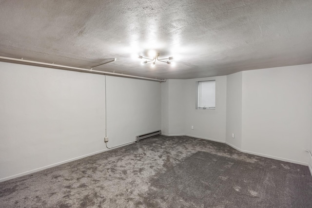 4922 Sheridan Ave S, Minneapolis, MN 55410 - basement featuring a baseboard radiator, carpet flooring, a textured ceiling, and baseboards
