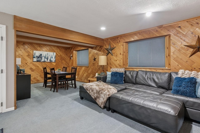 20561 Jade Cir, Lakeville, MN 55044 - carpeted living area featuring wood walls, recessed lighting, and beamed ceiling