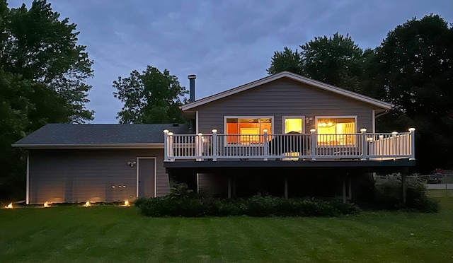 20561 Jade Cir, Lakeville, MN 55044 - back of house featuring a wooden deck and a lawn