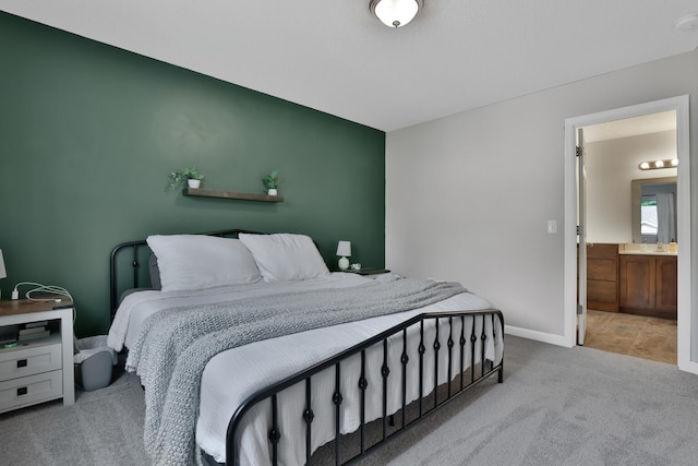 30619 Revere Ave, Shafer, MN 55074 - carpeted bedroom with baseboards and ensuite bathroom