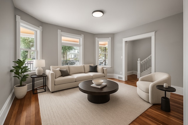 1527 Minnehaha Ave W, Saint Paul, MN 55104 - living area featuring wood finished floors, plenty of natural light, baseboards, and stairs