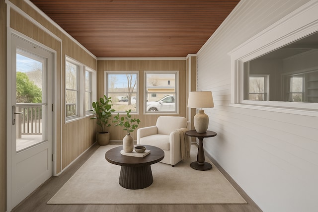 1527 Minnehaha Ave W, Saint Paul, MN 55104 - sitting room with healthy amount of natural light, ornamental molding, wood ceiling, baseboards, and wood finished floors