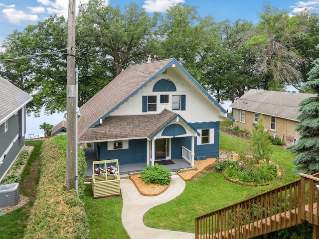 3886 Eagle Rd, Willmar, MN 56201 - view of front of property featuring a shingled roof, a front yard, and a porch