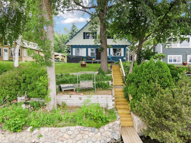 3886 Eagle Rd, Willmar, MN 56201 - view of front of home with stairs and a front lawn