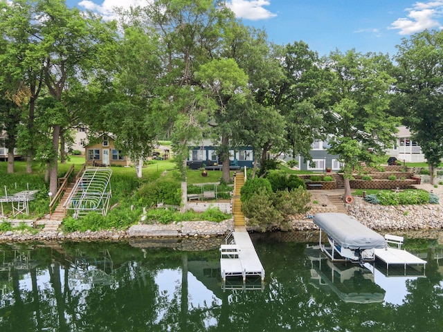 3886 Eagle Rd, Willmar, MN 56201 - dock area featuring stairway, boat lift, and a water view