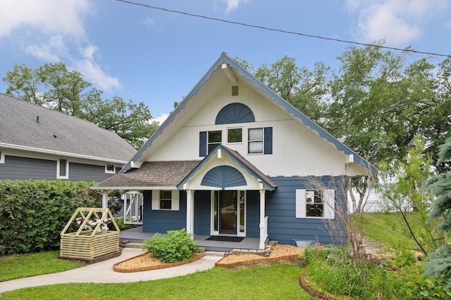 3886 Eagle Rd, Willmar, MN 56201 - view of front facade with covered porch and a front lawn