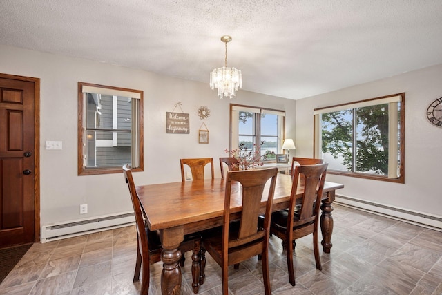 3886 Eagle Rd, Willmar, MN 56201 - dining room with a baseboard radiator, a chandelier, a textured ceiling, and a baseboard heating unit