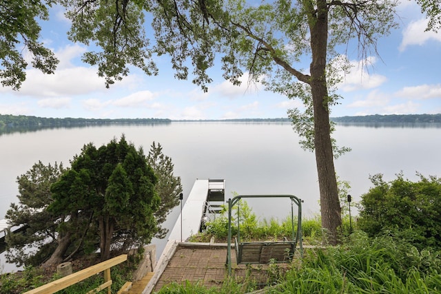 3886 Eagle Rd, Willmar, MN 56201 - water view featuring a boat dock