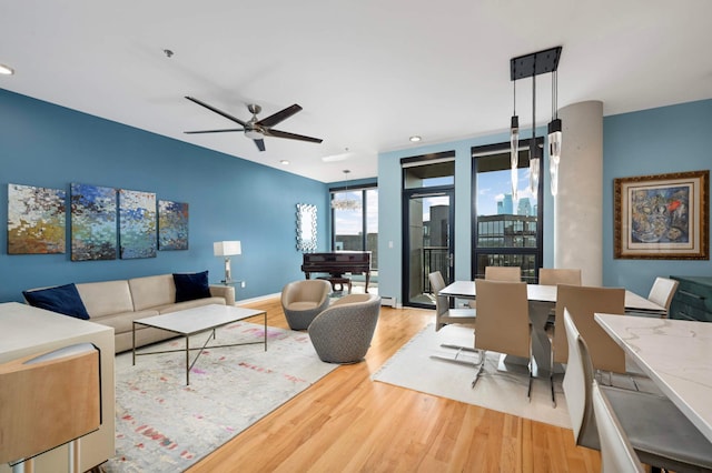 1240 2nd St Unit 1120, Minneapolis, MN 55415 - living area with wood finished floors, ceiling fan, and recessed lighting