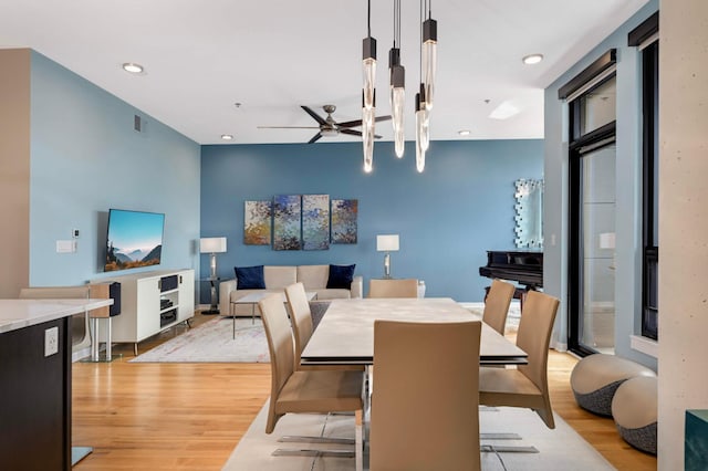 1240 2nd St Unit 1120, Minneapolis, MN 55415 - dining area featuring light wood-style flooring, a ceiling fan, and recessed lighting
