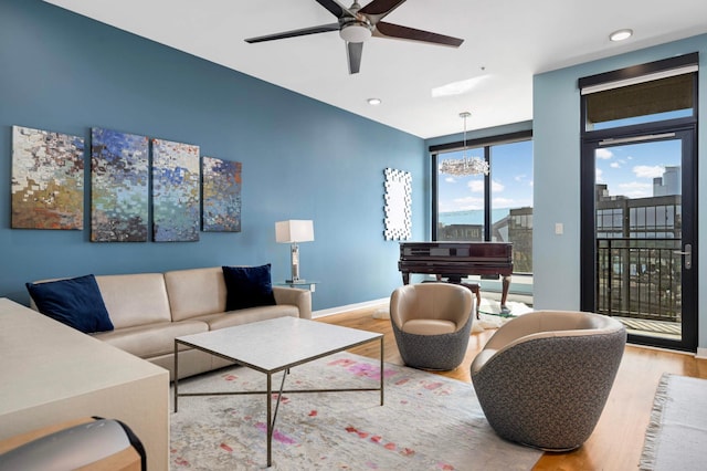 1240 2nd St Unit 1120, Minneapolis, MN 55415 - living area with wood finished floors, ceiling fan, baseboards, and recessed lighting