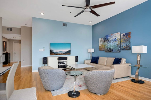 1240 2nd St Unit 1120, Minneapolis, MN 55415 - living room with a ceiling fan, baseboards, light wood-type flooring, and recessed lighting
