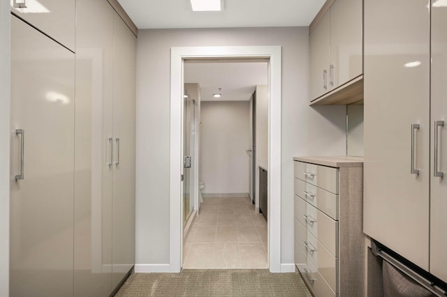 1240 2nd St Unit 1120, Minneapolis, MN 55415 - hall featuring baseboards and light tile patterned floors