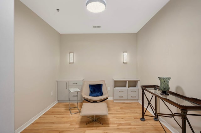 1240 2nd St Unit 1120, Minneapolis, MN 55415 - sitting room with light wood finished floors and baseboards