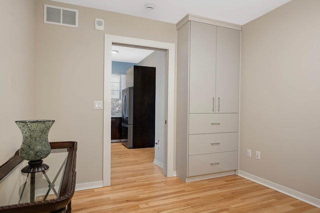 1240 2nd St Unit 1120, Minneapolis, MN 55415 - corridor with light wood-style floors and baseboards