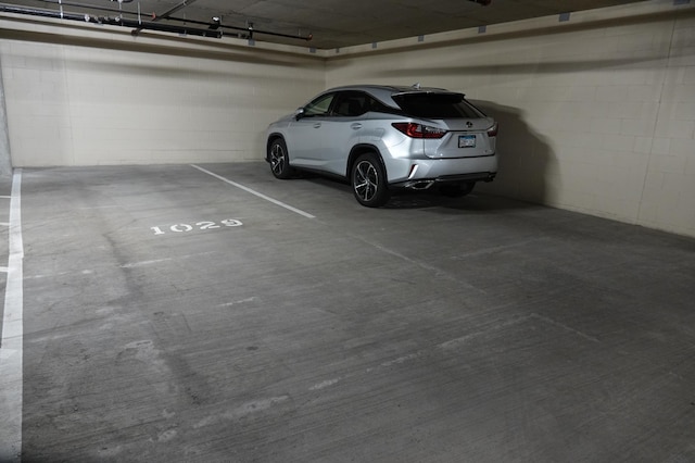 1240 2nd St Unit 1120, Minneapolis, MN 55415 - parking deck featuring concrete block wall