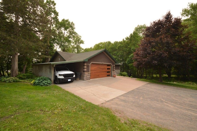 12207 285th St, Lindstrom, MN 55045 - view of property exterior with stone siding, a yard, and driveway