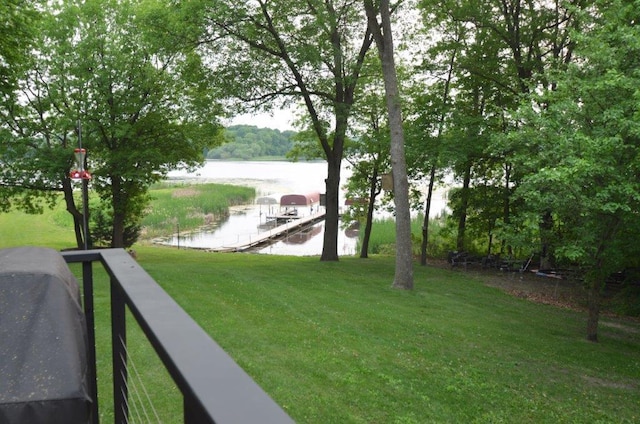 12207 285th St, Lindstrom, MN 55045 - view of green lawn featuring a water view and a dock