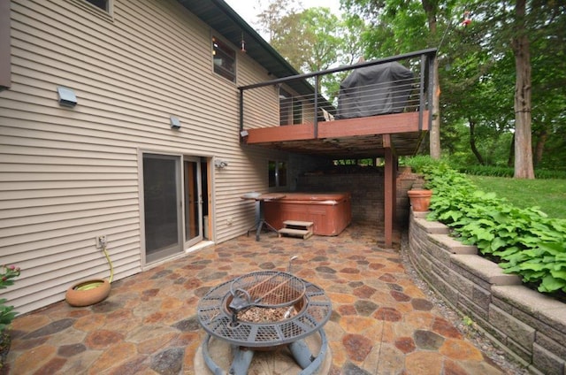 12207 285th St, Lindstrom, MN 55045 - view of patio / terrace featuring a hot tub, an outdoor fire pit, and a deck