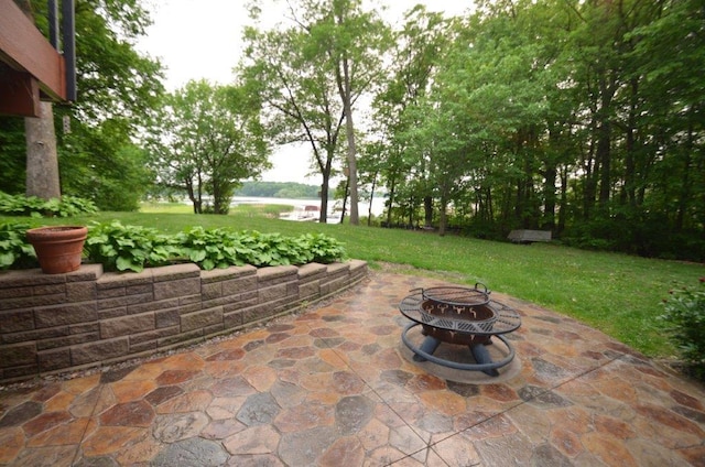 12207 285th St, Lindstrom, MN 55045 - view of patio featuring an outdoor fire pit