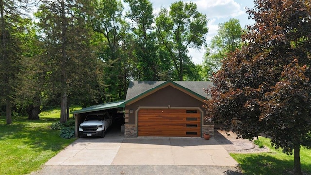 12207 285th St, Lindstrom, MN 55045 - view of front of home featuring stone siding, a front yard, driveway, and a garage