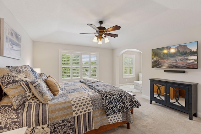11668 Azure Ct, Inver Grove Heights, MN 55077 - bedroom featuring light carpet, arched walkways, and a ceiling fan
