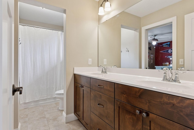11668 Azure Ct, Inver Grove Heights, MN 55077 - bathroom with double vanity, ceiling fan, and tile patterned floors