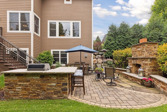 11668 Azure Ct, Inver Grove Heights, MN 55077 - view of patio / terrace featuring an outdoor stone fireplace and stairway