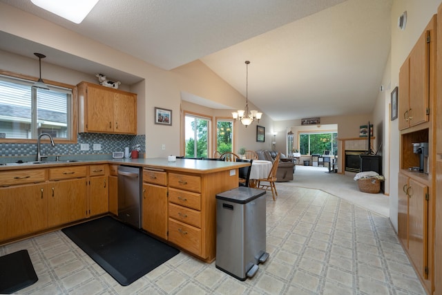 812 Plum Tree Ln, Somerset, WI 54025 - kitchen featuring dishwasher, a sink, a peninsula, open floor plan, and light countertops