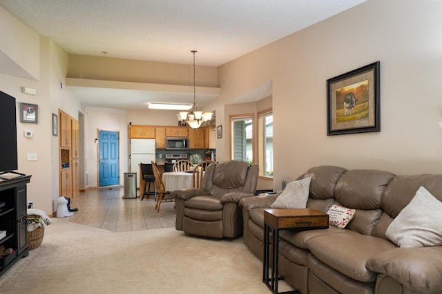 812 Plum Tree Ln, Somerset, WI 54025 - living area featuring a chandelier, light colored carpet, and light wood-style flooring