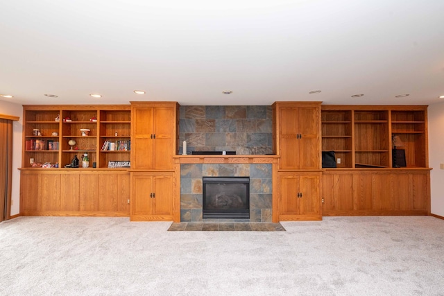 1406 English Ave NW, New Prague, MN 56071 - unfurnished living room with recessed lighting, a fireplace, and carpet floors