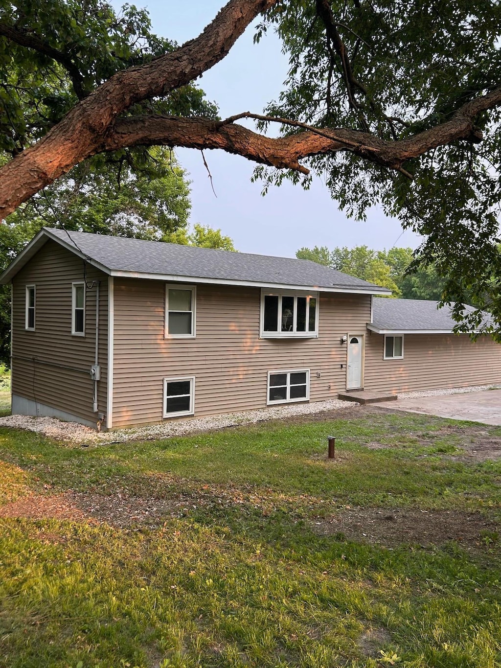 24927 Narcissus St NW, Isanti, MN 55040 - view of front of property with a front lawn