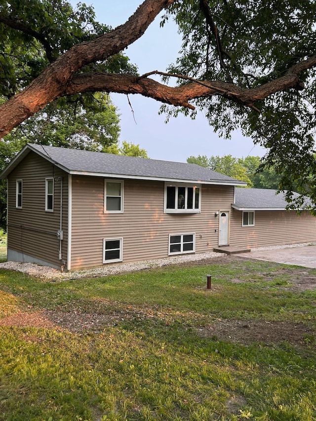 24927 Narcissus St NW, Isanti, MN 55040 - view of front of property with a front lawn
