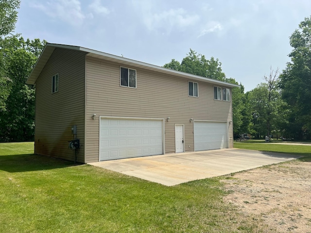 6460 Mountain Maple Ln NW, Walker, MN 56484 - view of home's exterior featuring a garage, driveway, and a yard