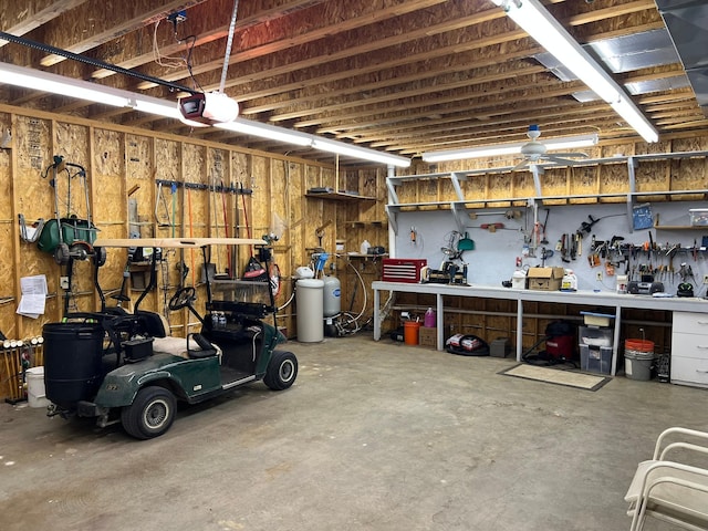 6460 Mountain Maple Ln NW, Walker, MN 56484 - garage featuring a workshop area and a garage door opener