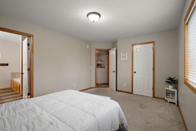 7331 Lamont Ave NE, Otsego, MN 55301 - bedroom featuring multiple windows, light carpet, and a textured ceiling