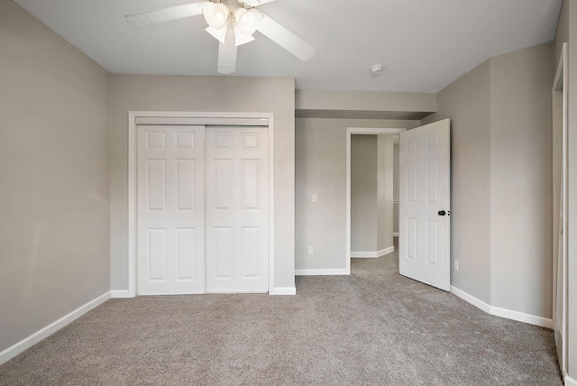7331 Lamont Ave NE, Otsego, MN 55301 - unfurnished bedroom featuring carpet floors, a closet, and a ceiling fan
