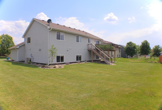 7331 Lamont Ave NE, Otsego, MN 55301 - rear view of property with stairway, a deck, and a lawn
