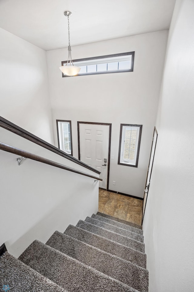 1347 13th St W, West Fargo, ND 58078 - stairs with a high ceiling