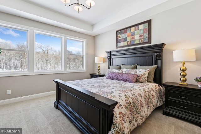 4110 Osprey Ct NE, Prior Lake, MN 55372 - bedroom featuring light colored carpet, a chandelier, and baseboards