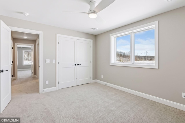 4110 Osprey Ct NE, Prior Lake, MN 55372 - unfurnished bedroom with light colored carpet, baseboards, and a closet