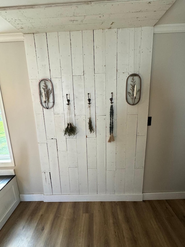 8339 71st St, West Concord, MN 55985 - detailed view of wood finished floors, baseboards, and wooden walls