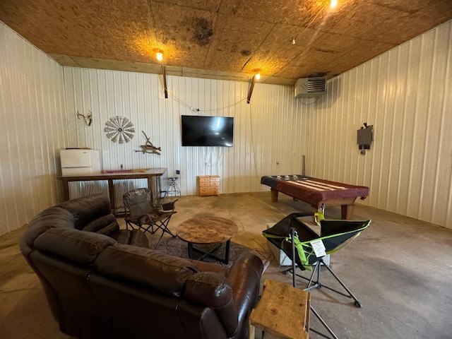 8339 71st St, West Concord, MN 55985 - living room with billiards, concrete flooring, and wood walls