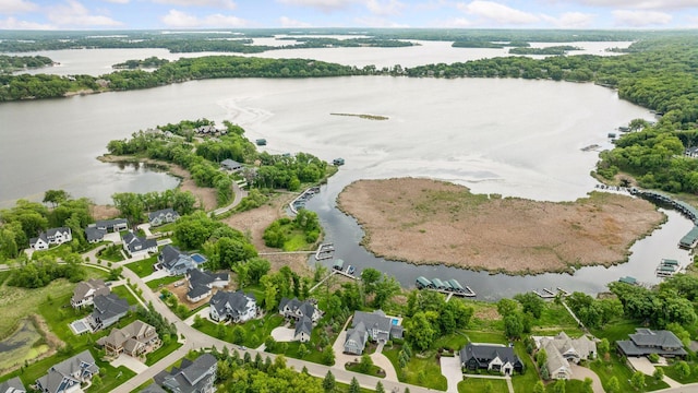3758 Woodland Cove Pkwy, Minnetrista, MN 55331 - aerial perspective of suburban area with a large body of water and a forest