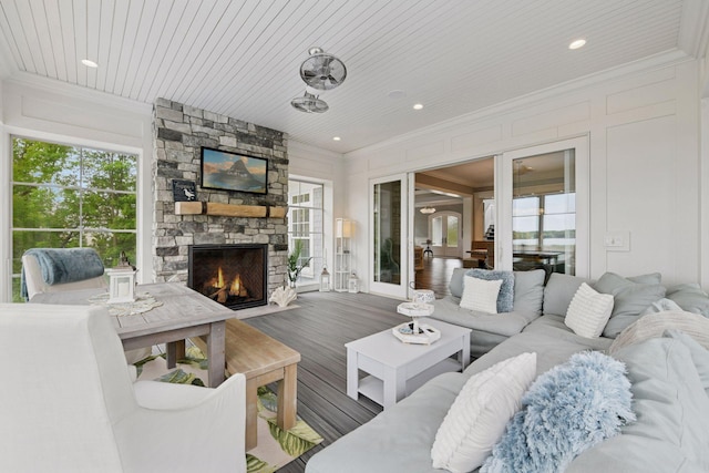 3758 Woodland Cove Pkwy, Minnetrista, MN 55331 - living area with ornamental molding, an outdoor stone fireplace, wood finished floors, recessed lighting, and wood ceiling