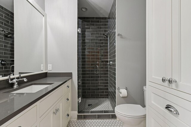 3758 Woodland Cove Pkwy, Minnetrista, MN 55331 - bathroom with a stall shower, vanity, and tile patterned floors