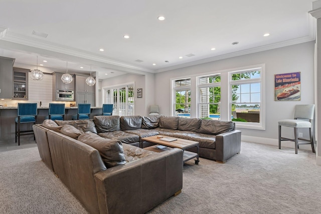 3758 Woodland Cove Pkwy, Minnetrista, MN 55331 - living area with ornamental molding, recessed lighting, and light colored carpet